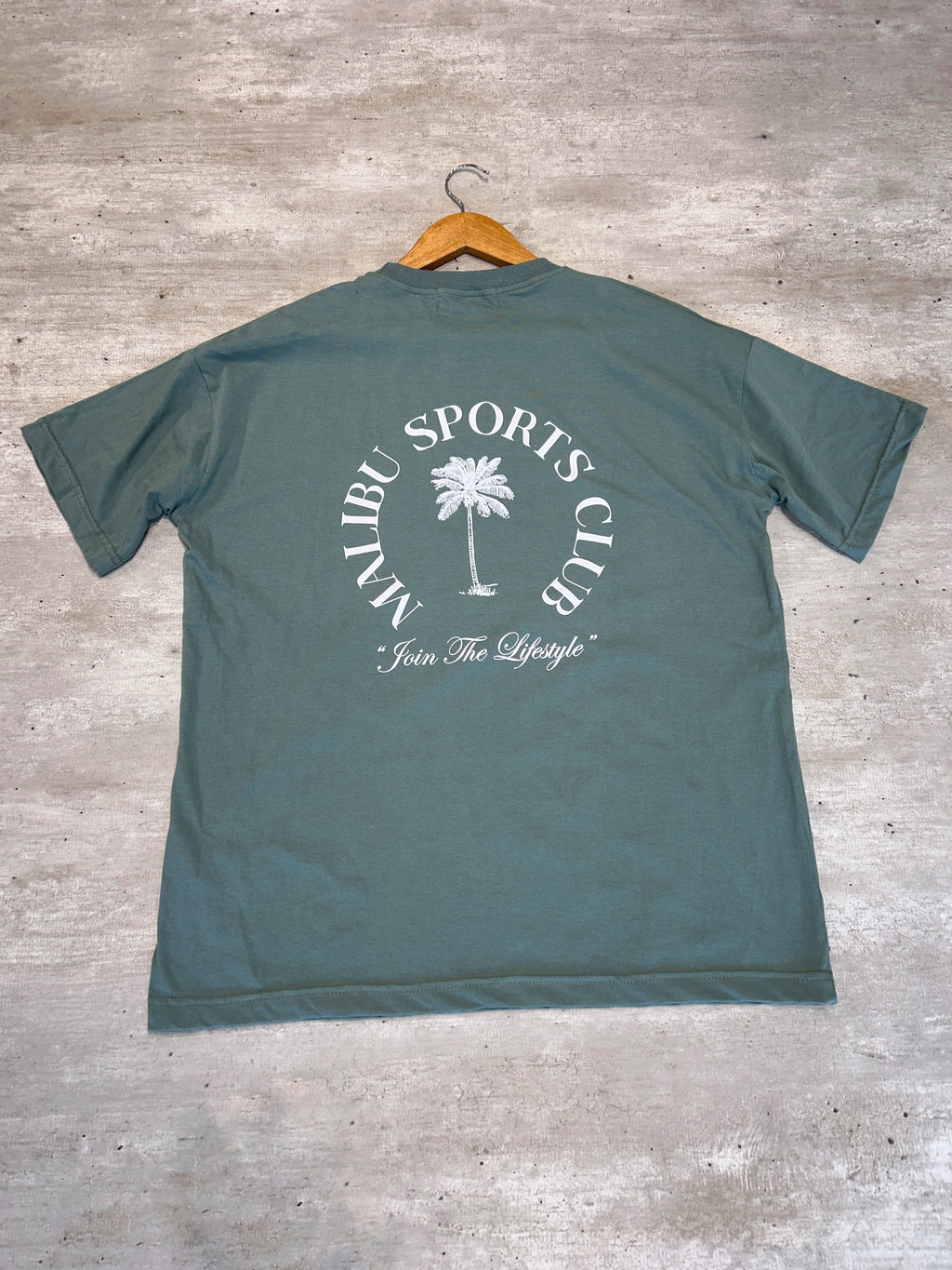 Remera verde palmera 🌴 (espalda)