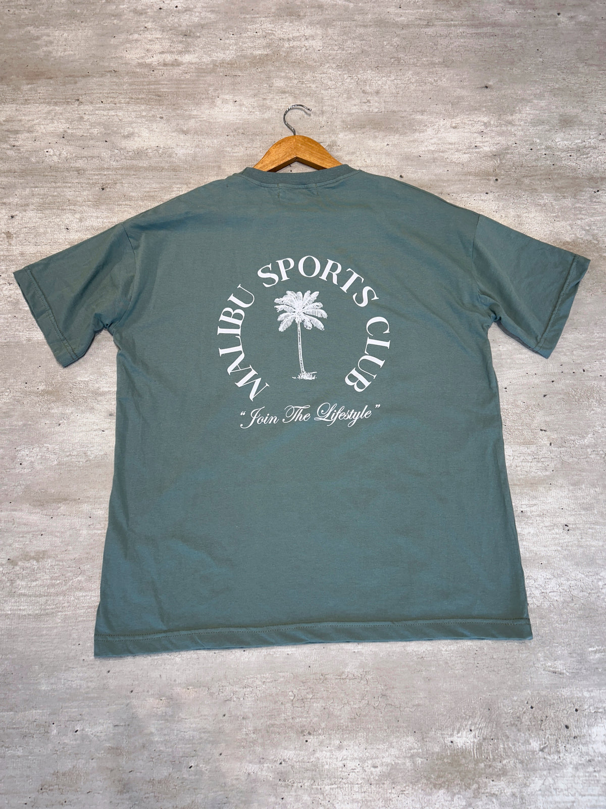 Remera verde palmera 🌴 (espalda)